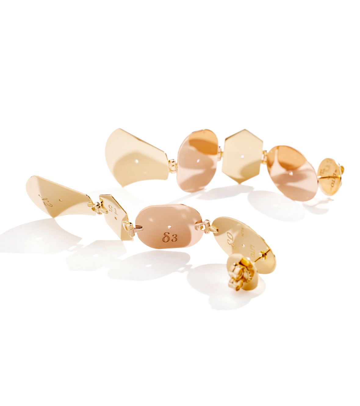 Multi shaped pair of earrings