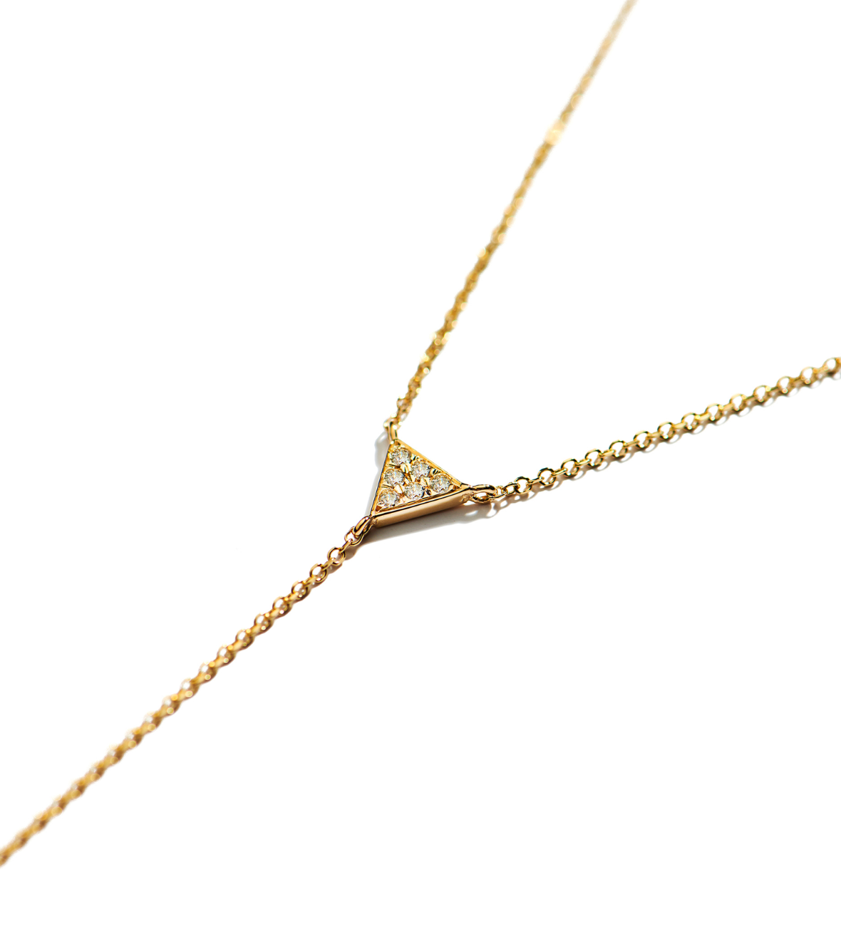 14K yellow gold "Mini Ellipse" necklace with a triangle of white brilliant cut Diamonds.